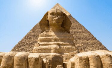 Great Sphinx and Cheops Pyramid view during your Cairo and Pyramids Tour
